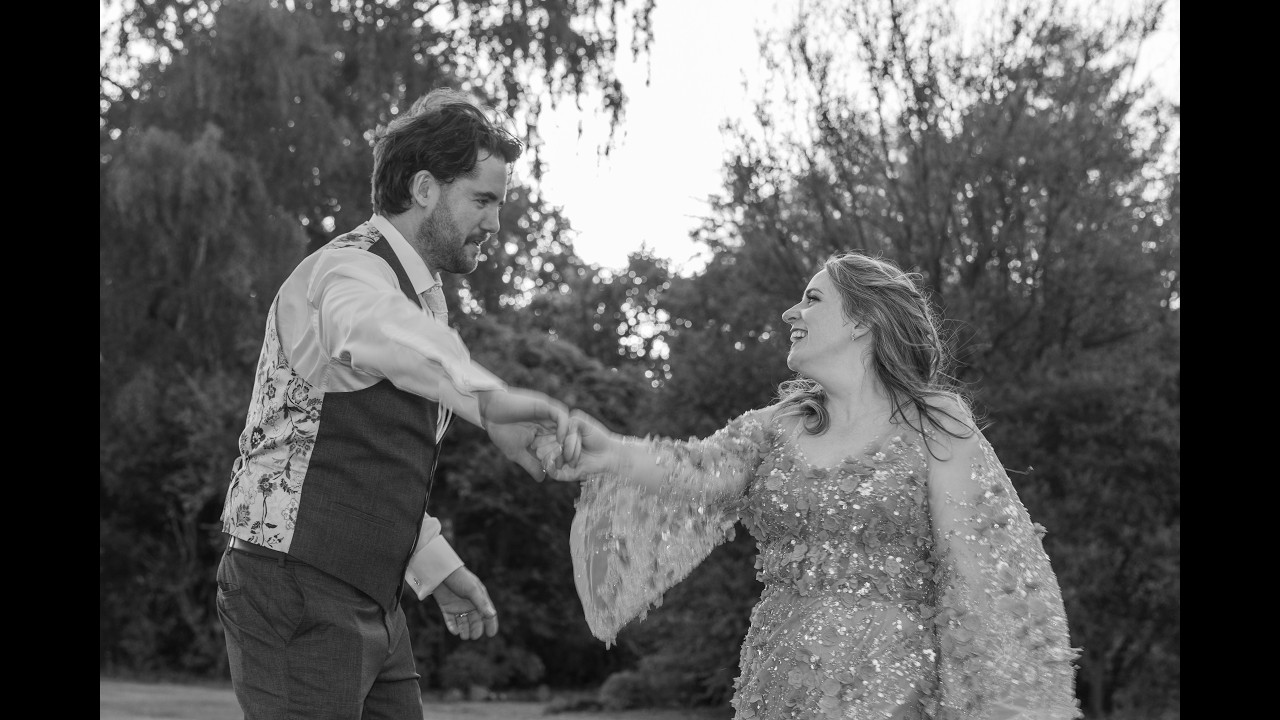Rhiannon and John in their wedding highlight reel